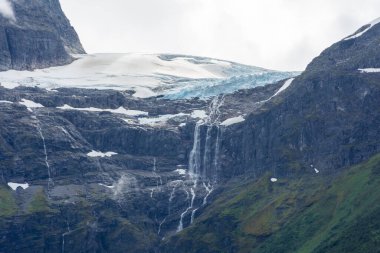 View of the Jostedalen Glacier melting over the Lovatnet Lake, Norway