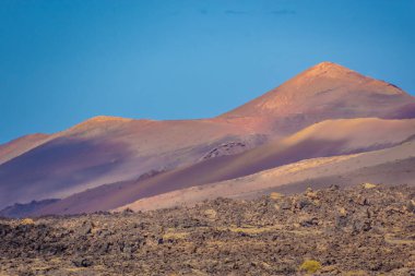 Wild volcanic landscape of the Timanfaya National Park, Lanzarote, Canary Islands, Spain
