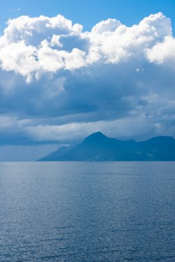 Fjord landscape from a ferry cruise in Molde, Norway clipart