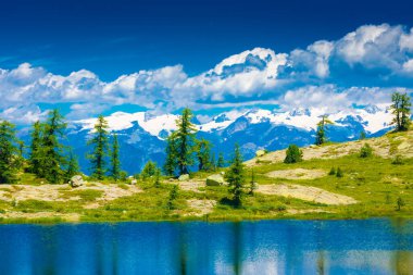 Reflection on the Mount Avic Lake in Aosta Valley, Italy