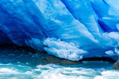 Detail of the Nigardsbreen Glacier, beautiful blue melting glacier in the Jostedalen National Park, Norway