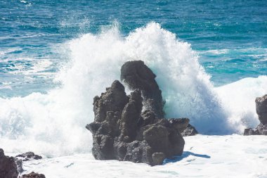 Powerful waves against the sea stacks of Lanzarote island, Atlantic Ocean, Canary Islands, Spain