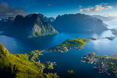 Amazing landscape of the Lofoten Islands from the top of Reinebringen Mountain with blue sky, Norway