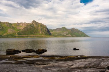 The Tungeneset (Devil's Teeth), mountains over the ocean in Senja Island, Norway