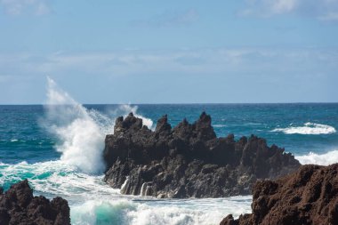 Powerful waves against the sea stacks of Lanzarote island, Atlantic Ocean, Canary Islands, Spain