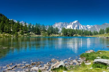 Beautiful reflection of the Mont Blanc on the Arpy Lake, Aosta Valley, Italy