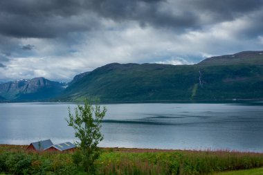 Cloudy sky over a fjord in Norway