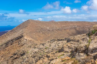 Dramatic landscape viewed from the top of Caldera Blanca volcano, Lanzarote, Canary Islands, Spain