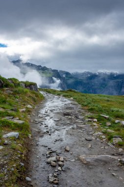 Mountain trail to hike to Trolltunga scenic spot, Norway