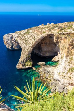 The Blue Grotto of Malta, rock formation on the sea with crystal clear water