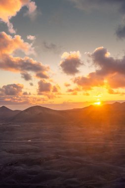 Amazing sunset over El Cuervo Volcano, in Lanzarote, Canary Islands, Spain