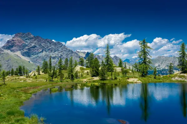 Reflection on the Mount Avic Lake in Aosta Valley, Italy