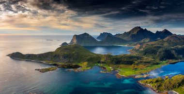 Amazing panorama of the Lofoten Islands sunset from Offersoykammen mount trail, Norway