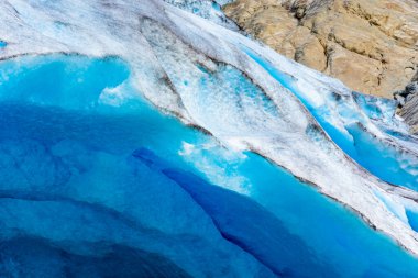 Detail of the Nigardsbreen Glacier, beautiful blue melting glacier in the Jostedalen National Park, Norway