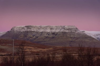 Snowy mountain the Reykjavik outskirts, Iceland clipart