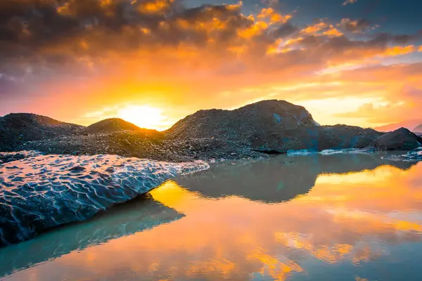 stock image Amazing sunset over the melted ice of Vatnajokull Glacier National Park, Iceland