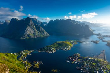 Amazing landscape of the Lofoten Islands from the top of Reinebringen Mountain with blue sky, Norway