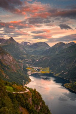 Sunset over the Geirangerfjord and the Seven Sisters Waterfall, Norway