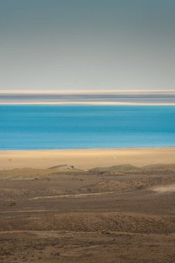 Layers of desert, salt marsh and water of the Aral Lake, Uzbekistan clipart