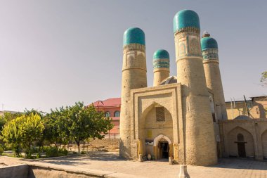 Gün batımında Chor Minor Madrasah, Buhara, Özbekistan
