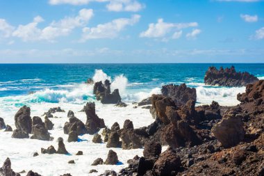 Powerful waves against the sea stacks of Lanzarote island, Atlantic Ocean, Canary Islands, Spain