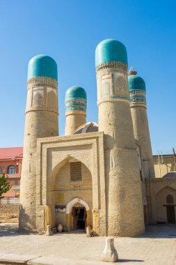 Gün batımında Chor Minor Madrasah, Buhara, Özbekistan
