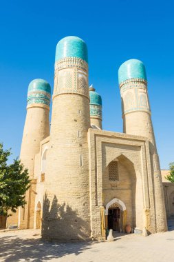 Gün batımında Chor Minor Madrasah, Buhara, Özbekistan