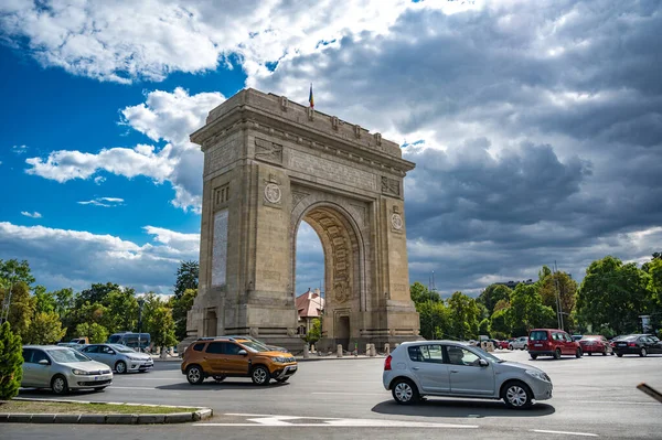 stock image BUCHAREST, ROMANIA - SEPTEMBER 13 2022: Arcul de Triumf, a triumphal arch, the northern part of Bucharest, on the Kiseleff Road. High quality photo