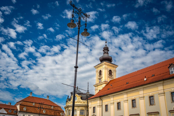 Sibiu, Romania - September 16 2022: Large Square - Piata Mare with the City Hall and Brukenthal palace in Transylvania. High quality photo
