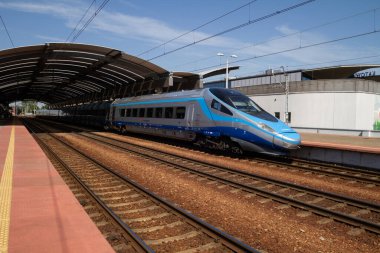 Katowice, Poland - July 22, 2022: Premium express Pendolino train at Katowice main railway station. Polish state railways PKP modern high-speed Alstom EMU250.
