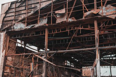 Ruins of a building after fire. Ruins after fire disaster, loss and despair concept.