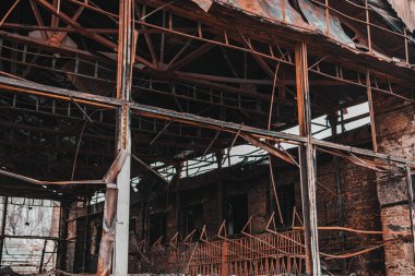 View of a deserted down building after a fire.