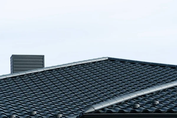 Modern types of roofing materials. Roof metal sheets.