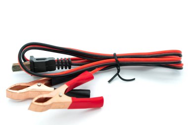 Cable with Crocodile clip. Metal crocodile clip. Black and red wires with copper clamps isolated on a white background.