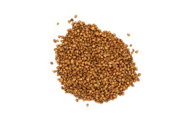 A bunch of buckwheat on a white background. Buckwheat grains. Top view.