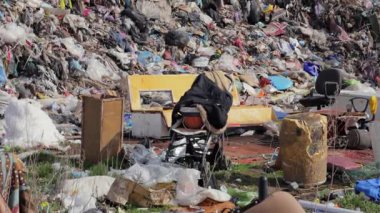An overwhelming amount of garbage and waste fills a landfill, highlighting ecological concerns and the urgent need for better waste management