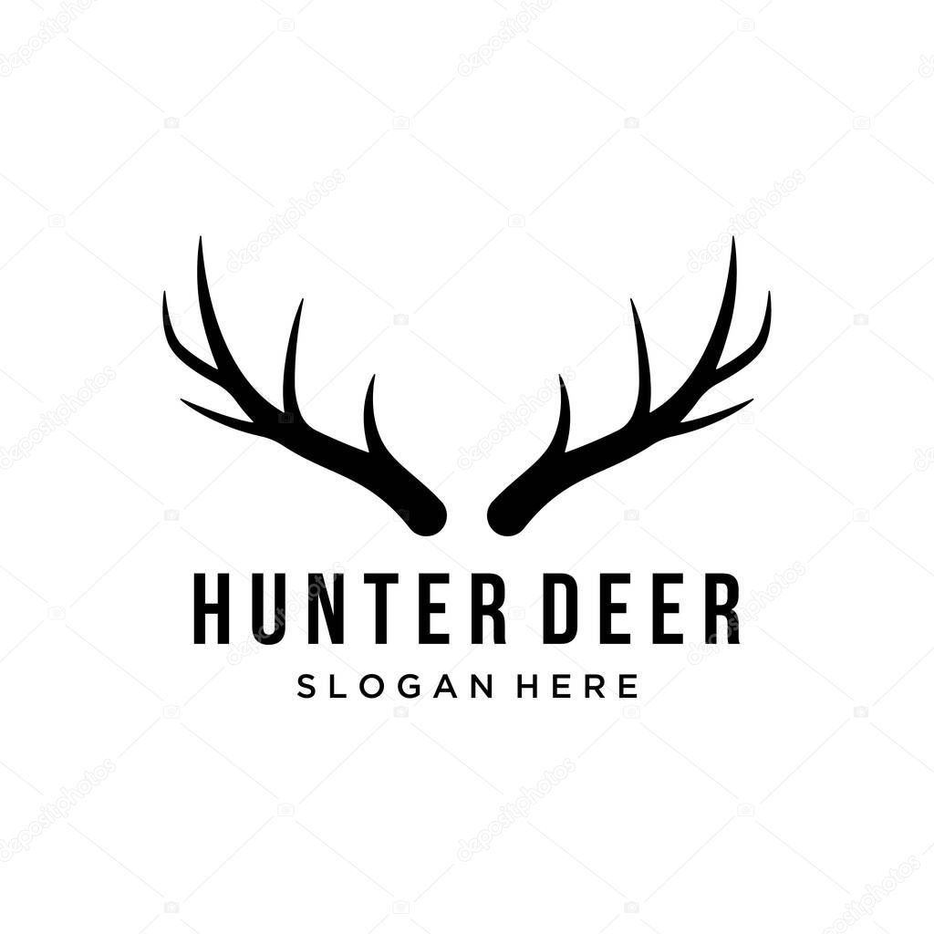 Deer Antlers and vintage deer head logo design.Logo for badge,deer hunter,adventure and wildlife.