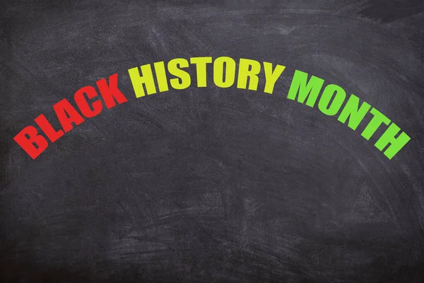 black history month text in three different color with blackboard background. African and American culture.