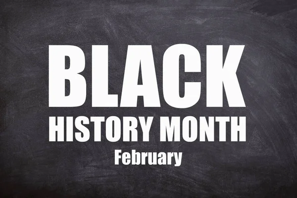 Black history month and February text in black board background.