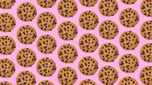 时尚的食物动画 环状背景或玫瑰背景上有巧克力滴的旋转饼干图案 — 图库视频影像