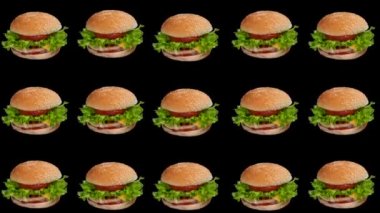 Hamburgerlerin, hamburgerlerin ya da çizburgerlerin siyah arka plandaki yemek animasyonları