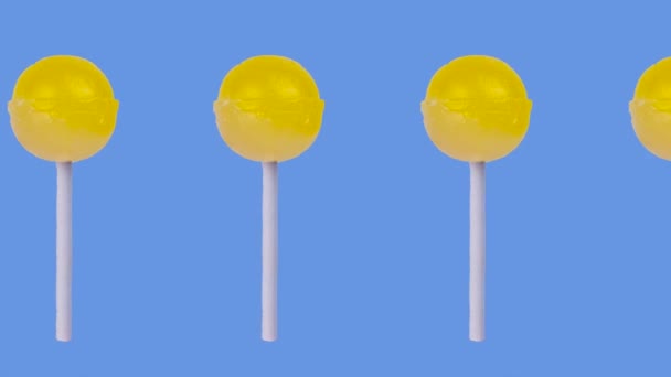 Trendy Food Animatie Van Veel Gele Fruitige Lolly Een Lila — Stockvideo