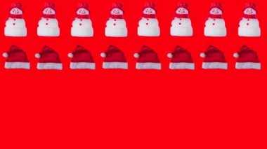 Noel balolarının, Noel Baba şapkasının, baston şekerlerin ve kardan adamın tekrarlanan animasyonları, Noel şablonu, yeni yıl konsepti.