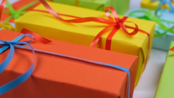 Rotating Spinning Background Holiday Gift Boxes Different Colors Ribbons Bows — 비디오