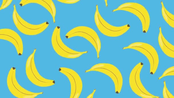 青を背景に回転するバナナがたくさん描かれた明るいトレンディーな漫画 高品質4K映像 — ストック動画