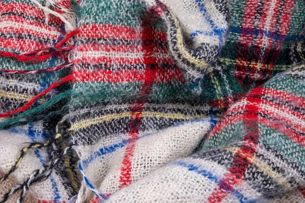 Mohair ekoseli ve püsküllü desenli yakın plan. Yüksek kalite fotoğraf