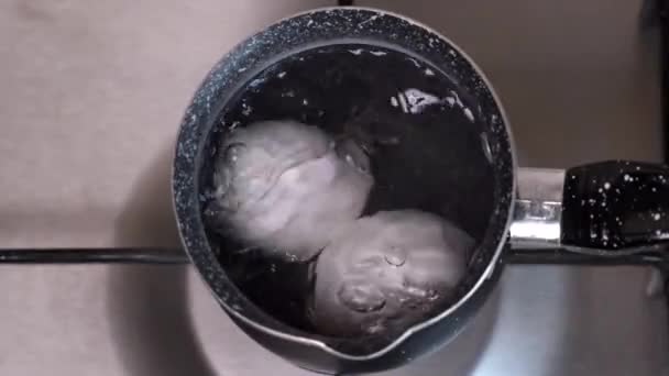 Eggs Boiled Boiling Water Gas Gray Stove Kitchen Close Top — Stock Video