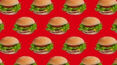 Kırmızı arka planda hamburgerlerin, hamburgerlerin ya da çizburgerlerin yemek animasyonları. Yüksek kalite 4k görüntü