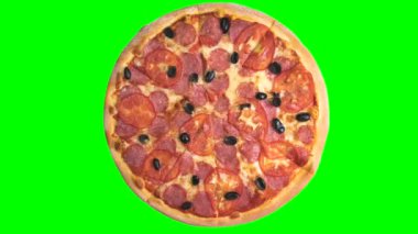  Yeşil renkli arka planda birçok farklı pizzanın döngü animasyonu. Yüksek kalite 4k görüntü