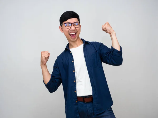 stock image Positive asian businessman happy successful show fist up isolated